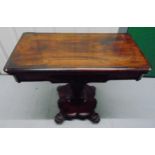 A Victorian mahogany rectangular games table the pedestal base on four claw feet, 75 x 91.5 x