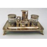 A George III hallmarked silver ink stand, rounded rectangular with reeded border, detachable glass