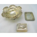 A quantity of hallmarked silver and white metal to include a bonbon dish, a matchbox cover and a pin