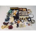 A quantity of costume jewellery to include rings, brooches, necklaces, earrings and bangles