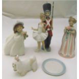 Three Lladro figurines of children, a dog and a pin tray, marks to the bases, tallest 26cm (h)