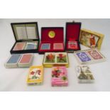 A quantity of playing cards of various style all in original packaging (12)