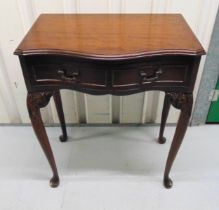 A mahogany shaped rectangular two drawer hall table on cabriole legs, 72 x 60 x 32cm