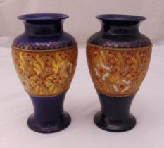 A pair of Doulton Lambeth baluster vases, blue ground with gilded decoration, marks to the bases,