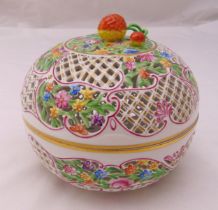 A Herend pierced lattice work bowl and cover decorated with flowers, the pull off cover surmounted