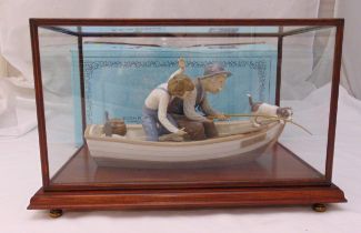 Lladró figurine Fishing with Grandpa 5215, marks to the base, to include rectangular glass display