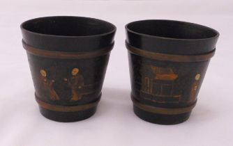 Two oriental papier mache vases in the form of buckets decorated with figures in a landscape,