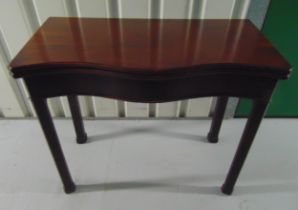 A mahogany shaped rectangular games table on four rectangular legs, 73.5 x 87 x 42.5cm (closed)