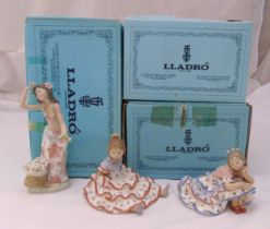 Three Lladró figurines of girls in traditional dress to include 1478 and 5389, marks to the bases,