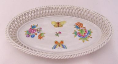 A Herend Queen Victoria pattern oval pierced dish with lattice border decorated with floral sprays