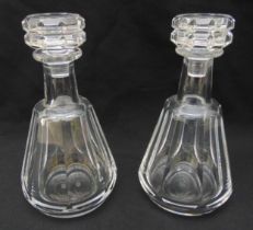 A pair of Baccarat Talleyrand conical decanters with drop stoppers, etched marks to the bases, 23.