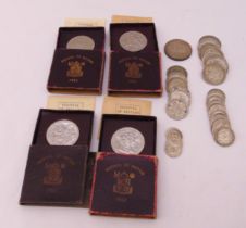 A quantity of GB coins to include pre 1947 silver and 1951 Festival of Britain in original cases
