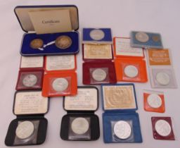 A quantity of silver and white metal coins and medallions some in original packaging (13)