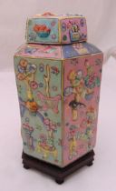A Chinese 20th century hexagonal ginger jar and cover decorated with flower and leaves mounted on
