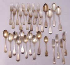 A quantity of early 19th century and Victorian hallmarked silver fiddle pattern flatware to