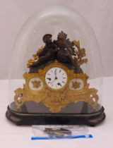 A French ormolu and bronze mantle clock, the circular white enamel dial with Roman numerals