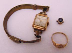 9ct gold ladies wristwatch, a 9ct gold signet ring and a sapphire set in 9ct gold