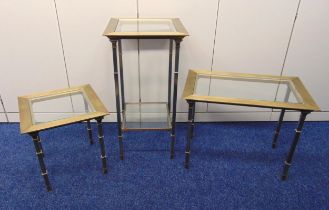 A set of three gilt metal and glass side tables on shaped rectangular legs, tallest 79cm (h)