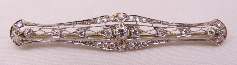 A white gold and diamond bar brooch, tested 14ct, approx total weight 6.2g