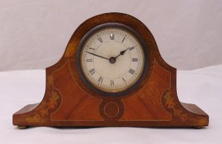 An Edwardian mantle clock of shaped oval form, the white enamel dial with Roman numerals, 16.5 x