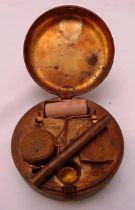 A late 19th century leather bound and metal travelling stationery set to include a roller, an