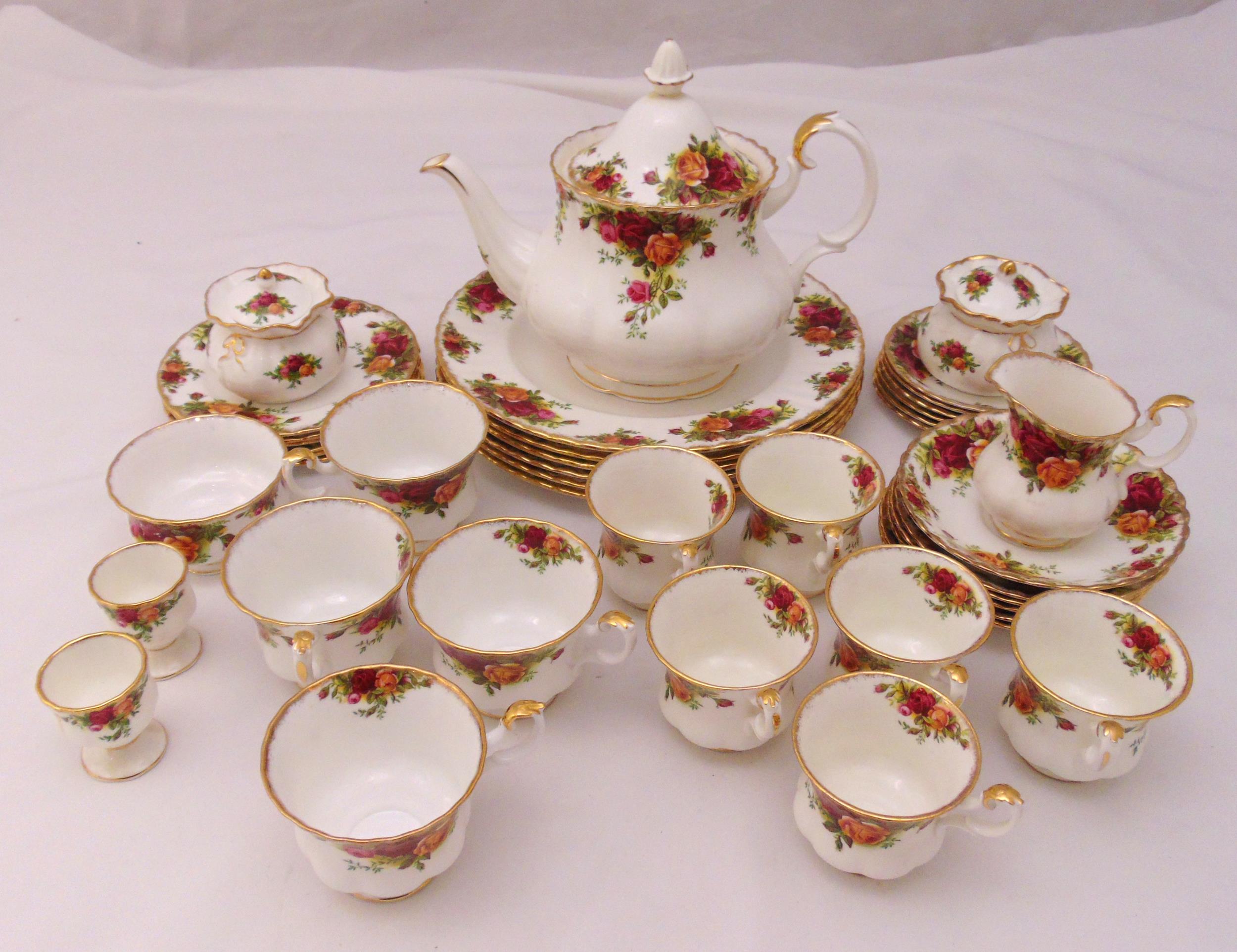 Royal Albert Old Country Roses dinner and teaset to include plates, cups, saucers and a teapot (