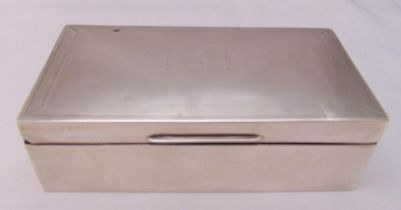 A rectangular hallmarked silver cigarette box with cedarwood lining, 16.5 x 8.5cm