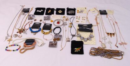 A quantity of costume jewellery to include rings, bracelets, brooches, earrings and necklaces