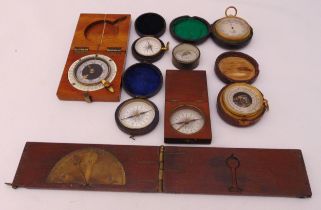 A quantity of scientific collectables to include compasses, barometer and a clinometer (8)