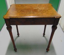 A late 19th century rectangular walnut and mahogany side table on four fluted tapering cylindrical
