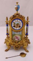 A French gilt metal and porcelain mantle clock, two train movement, to include pendulum, 37cm (h)