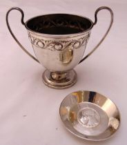A hallmarked silver twin handled trophy cup, scroll band, marks for Sibray, Hall & Co Sheffield 1918