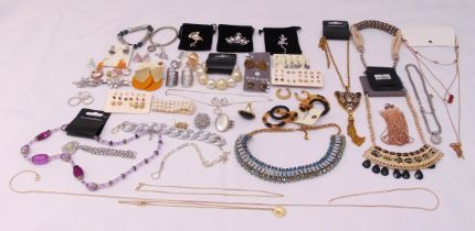 A quantity of costume jewellery to include earrings, necklaces, rings and brooches