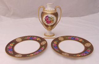 A Spode Regency vase with side handles decorated with flowers and gilding on square base, marks to