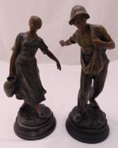 Two early 20th century spelter figures of labourers in the fields signed A Bofill on raised circular