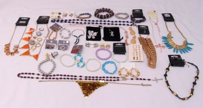 A quantity of costume jewellery to include rings, bracelets, earrings, necklaces and brooches