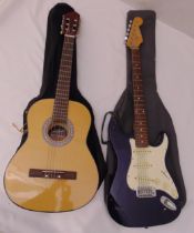 Gremlin Electric guitar in case and a cased Jose Ferrer acoustic guitar