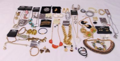 A quantity of costume jewellery to include necklaces, rings, earrings, brooches and bracelets