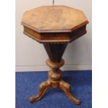 Victorian octagonal trumpet form sewing box the inlaid top revealing fitted interior on foliate
