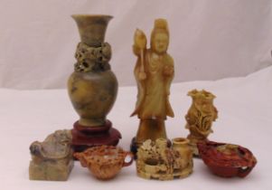 Seven Chinese soapstone carvings to include figurines vases and vegetation, tallest 30cm (h)