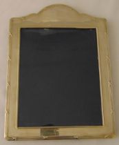 A hallmarked silver rectangular photograph frame with reed and tie borders, 36 x 26.5cm