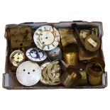 A box of clock dials and parts