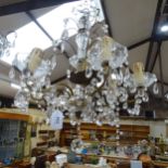 Vintage 6-branch glass chandelier with brass mounts and lustre drops, diameter 42cm approx