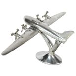 A polished aluminium aeroplane ornament, with 4 propellers, H22cm, W49cm, L30cm