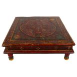 A Middle Eastern style low-centred coffee table with printed design, H15cm, 46cm square