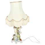 DRESDEN - an ornate Dresden table-top lamp with shade, with cherub and floral design, height