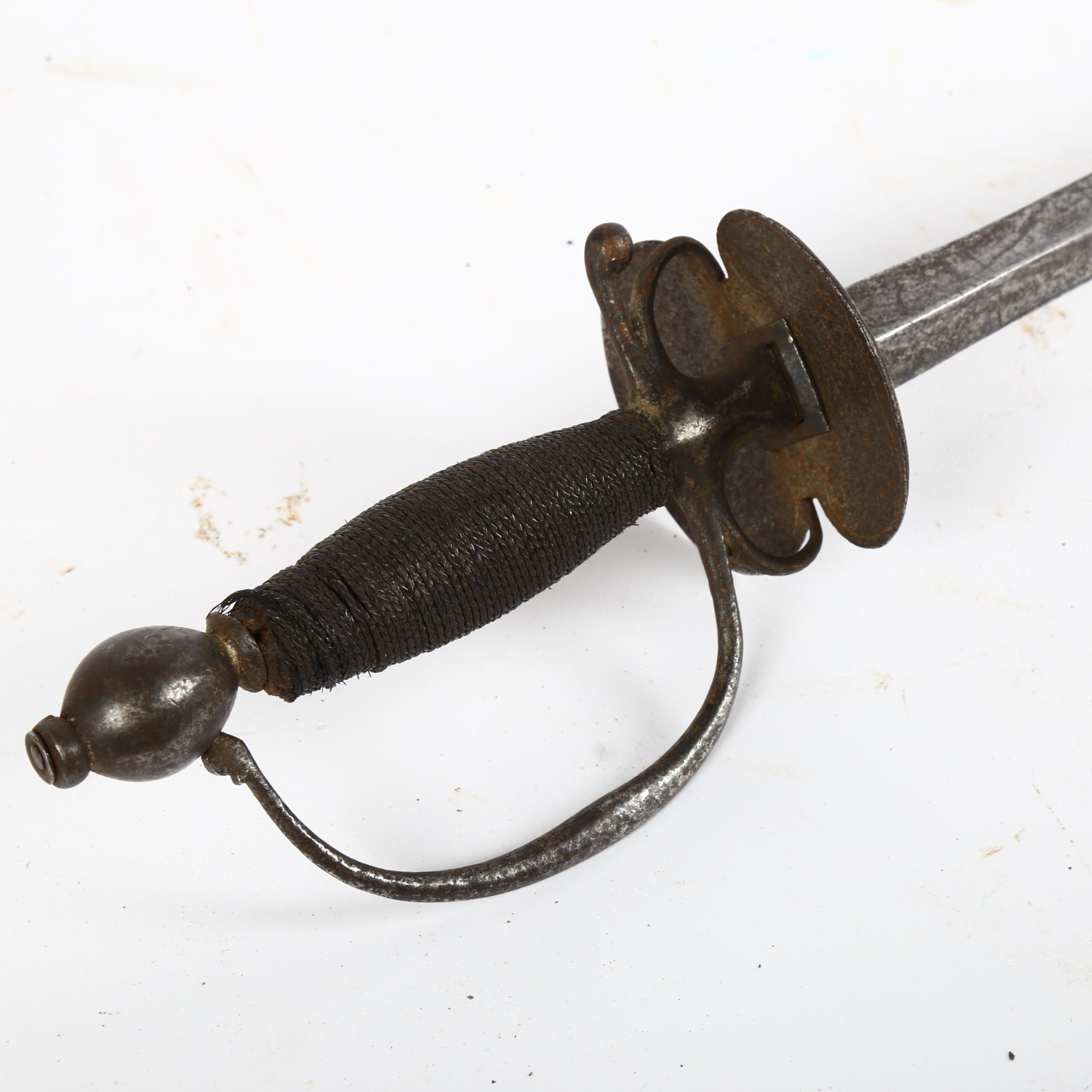 An Antique sword with triangular blade and double-shell guard, and metal woven grip, no maker's - Image 2 of 2