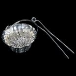 WITHDRAWN - A Chinese silver tea strainer, with pierced and fluted bowl with engraved decoration and