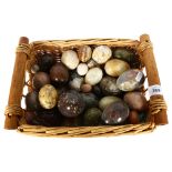 A basket-full of ornamental eggs of various sizes and dimensions, basket H15cm, L30cm, W25cm.