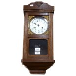 A Vintage stained oak 8-day drop-dial wall clock, case height 55cm, with pendulum